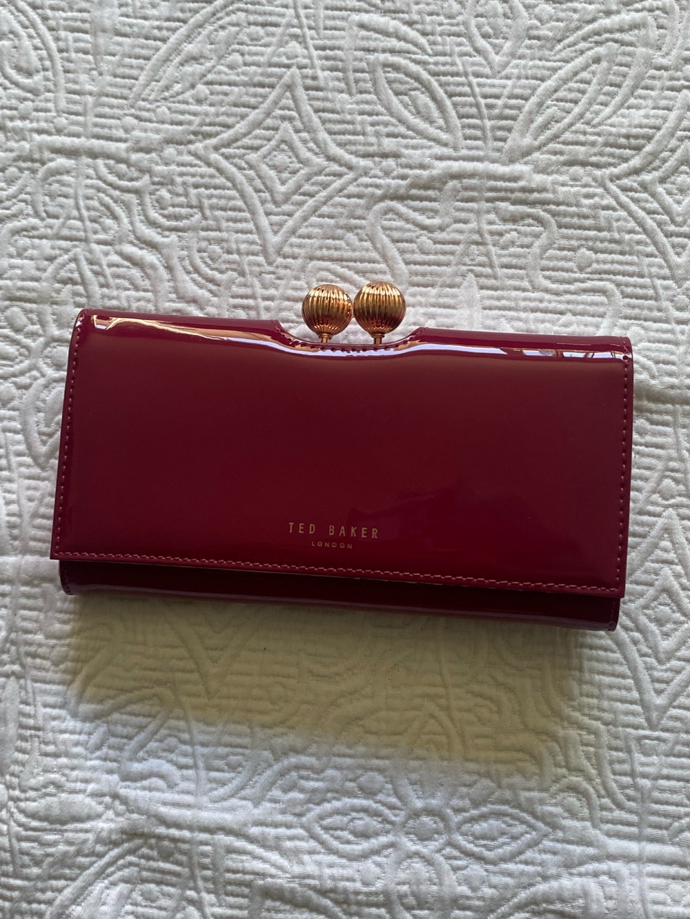Ted Baker Patent Clasp Wallet in Deep Wine with Gold Hardware